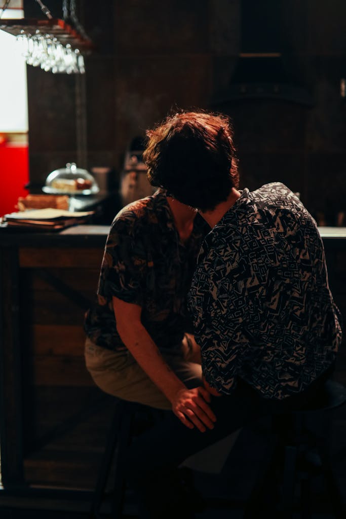A Couple Kissing at the Bar