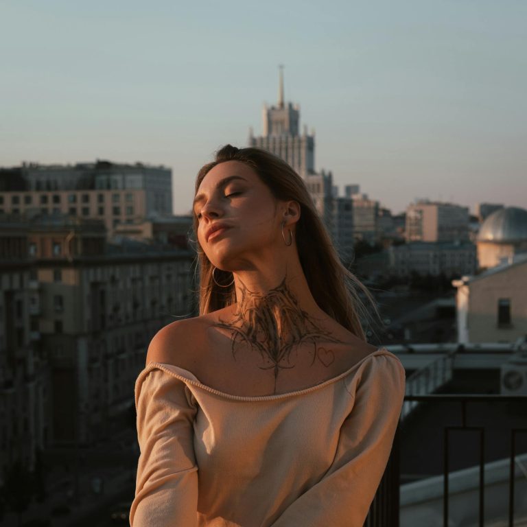 A woman in a dress on a balcony